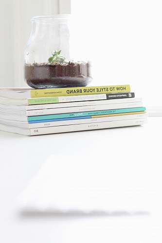 book stack of books on white table newark